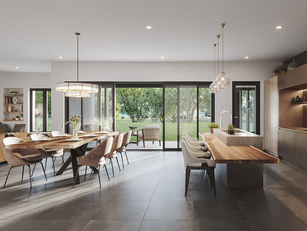 Large open plan kitchen and diner, back wall is sliding glass doors which are open, showing a little patio with chair and table.