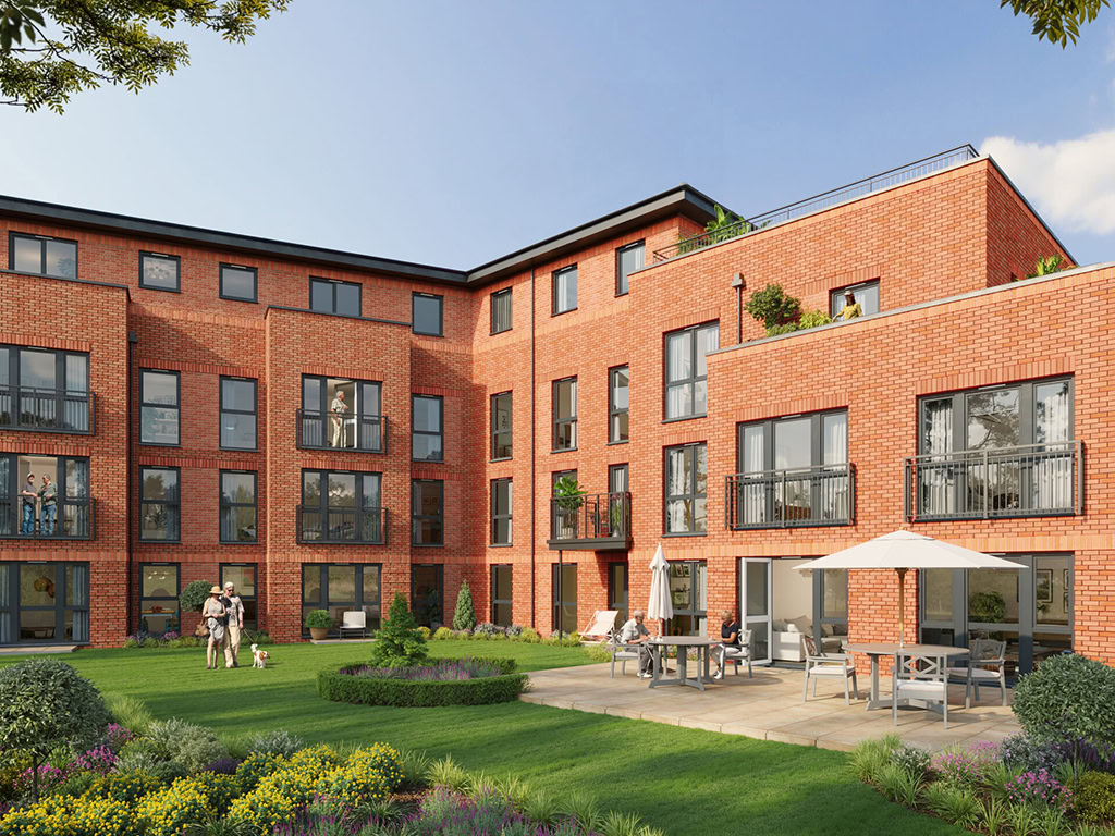 Rear view of apartment block with communal garden and patio area.