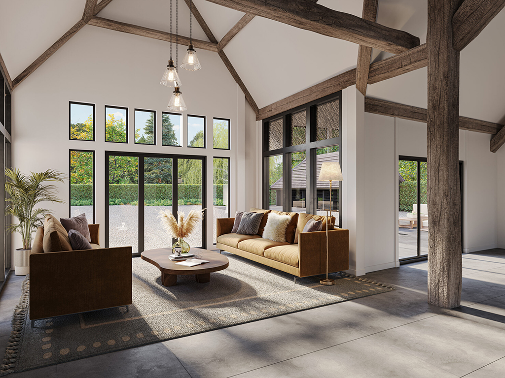 Rustic living room in converted barn with lager windows and wooden beams visible.