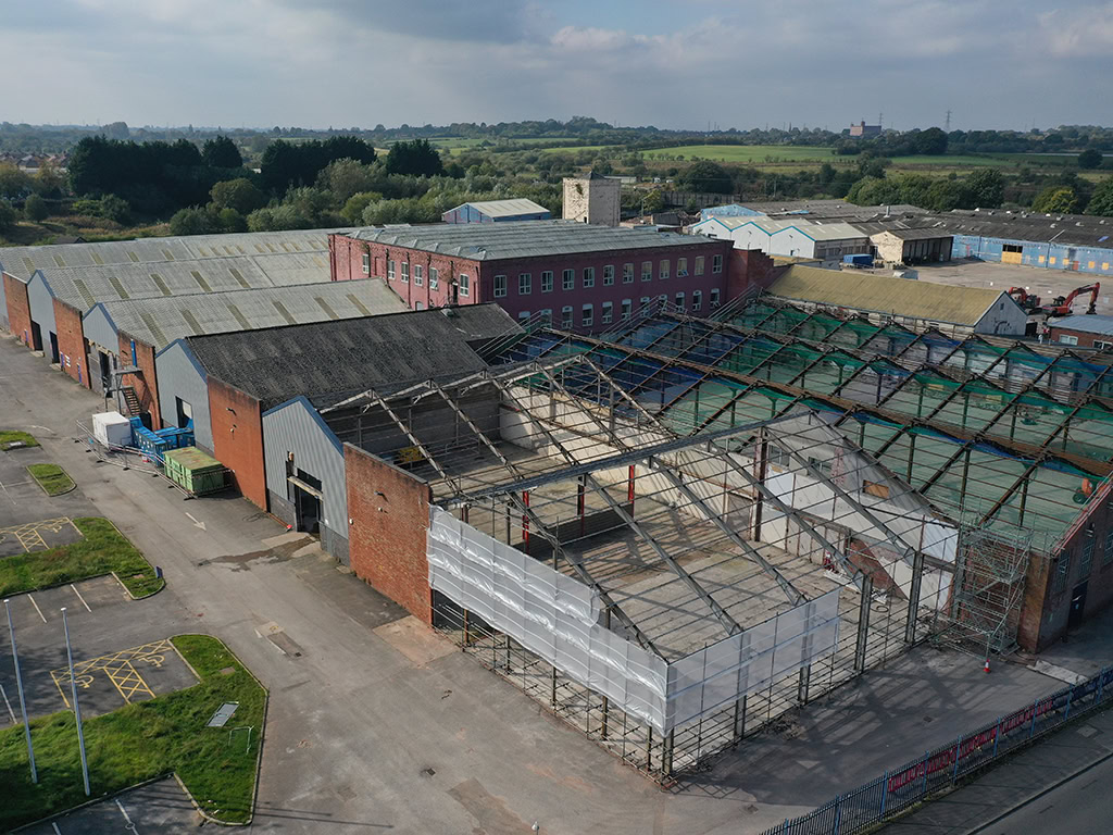 Warth Industrial Estate photomontage example, old buildings, some without roofs.